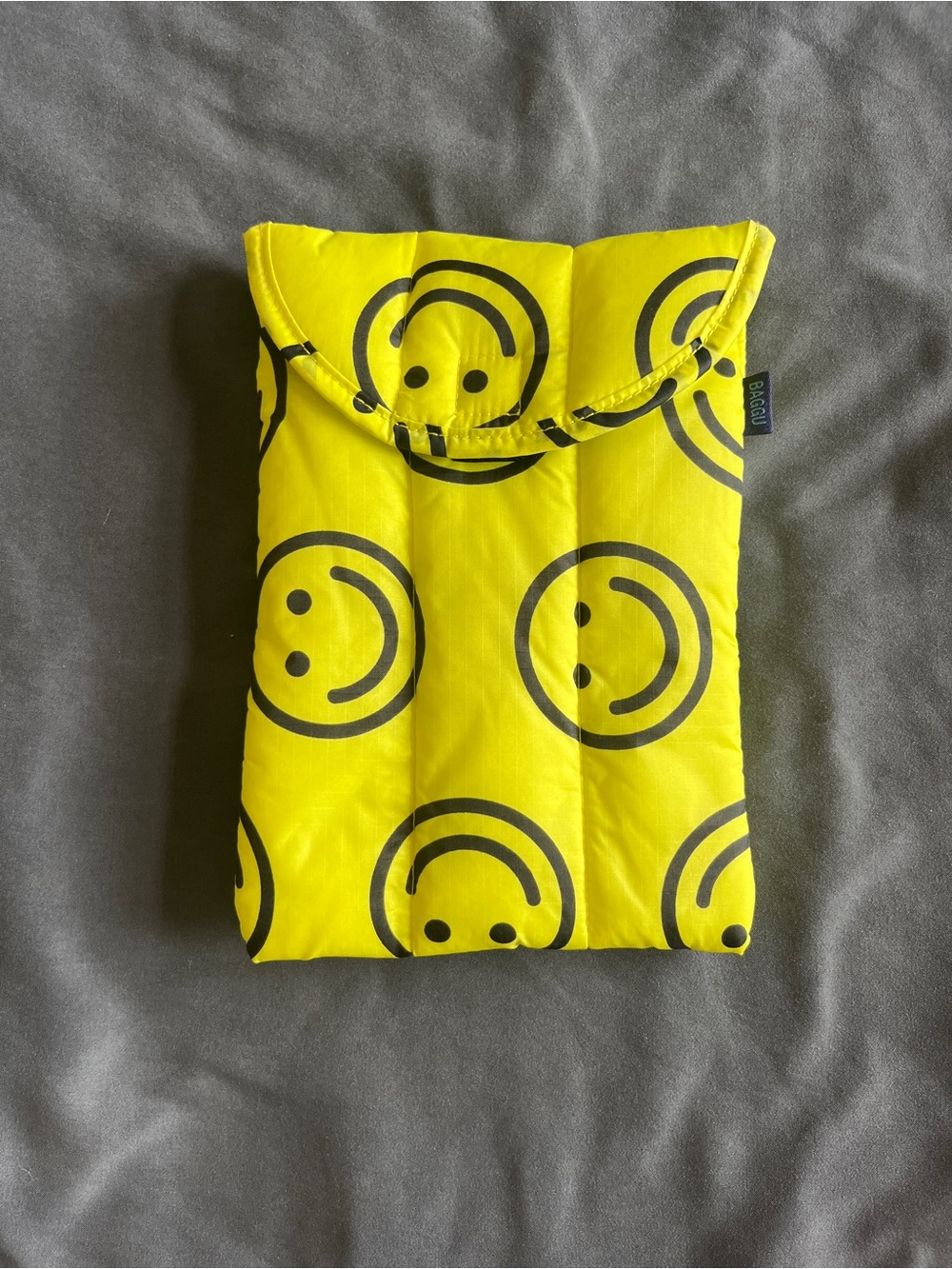 BAGGU Yellow Smiley Quilted Sleeve with Black Print
